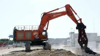 Hitachi EX1200-7 mit Schere.