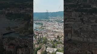 Vertical video. Zurich, Switzerland. Panorama of the city overlooking Lake Zurich. Summer day, Ae...