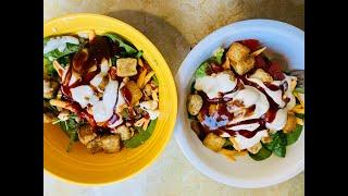 Spinach salad loaded with toppings, almonds , Vegan Ranch, BBQ & steak sauce- Our Life #hemp