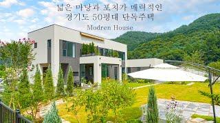 넓은 마당과 포치가 매력적인 경기도 50평대 단독주택 - 더존하우징 Modern House