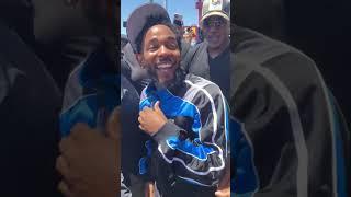 Fan tries to pinch Kendrick Lamar's cheek 