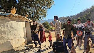 Cooperation among the villagers.  Babak installs the roof of Narges' brother's house @par8484