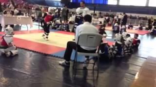 Julia (in red) sparring at United Taekwondo Tournament