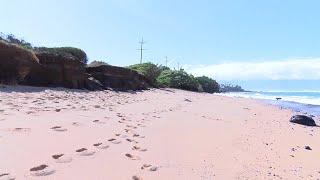 High surf reveals apparent human remains at a Maui Beach