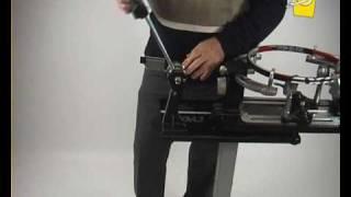 setting up tension force for manual stringing machine