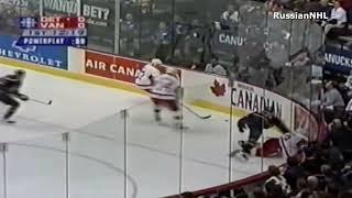 Ed Jovanovski welcomes Pavel Datsyuk to the NHL with a big boarding hit (6 oct 2001)