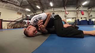 Knee on Belly to Reverse Triangle by Joel Bouhey