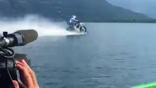 Motorbike Rides Across Water Surface - 987859