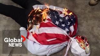 Protesters burn Trump effigy over threat to take control of Panama Canal