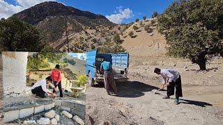 Buildig a driveway in frnt of the house: the Bekr family in the mountan cooperaion with the brothers