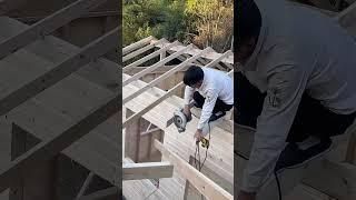 Stand On The Top Of Wooden House Frame to Saw Wood !