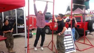 Brian Mello; Tucson Rodeo 2015; doing my max pull ups for a free prize