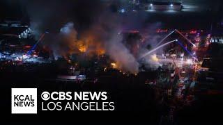 More than 70 firefighters working to contain large fire at Fontana pallet yard