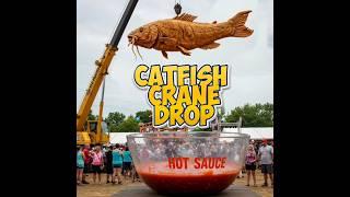 The Giant Catfish Drop: Hot sauce splash, then festival smash! #giantcatfishdrop #hotsauce #funnyvid