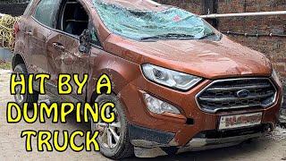 Ford Eco-sport hit by a dumping truck #automobile #crash #carcrashes