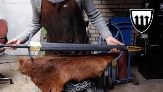 Forging a pattern welded long sword, the complete movie.