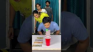 Blow the ball over water glass challenge #shorts #challenge #familygames