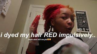 i impulsively dyed my hair bright red...