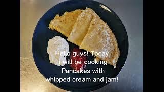 Pancakes with jam and whipped cream!