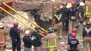 Rescuers working to save someone trapped after collapse in Louisville