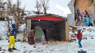 secret shelter in mountains:Taking shelter of mother and three children to the cave in snow blizzard