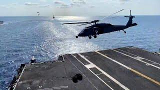 resupplying aircraft carrier USS Gerald R. Ford at sea with S-70 Seahawk helicopters! - time-lapse