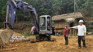 The engineer and the boss brought the machine back to help the young girl work.