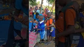 Guess the hapiness  which these little  souls are feeling to receive  school  materials