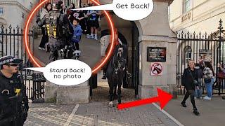 Police Officer STEPPED IN and deals with Stubborn tourist to STEP AWAY FROM THE HORSE!