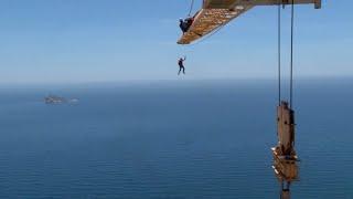 Daredevils Base Jump From Crane