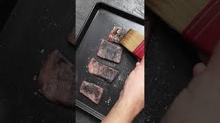 Plating Wagyu with Scallions on Libbey