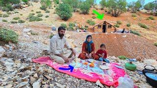A day in the life of a nomadic mother; from building a shelter to a simple meal by the fire 