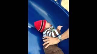 Preston goes down the slide