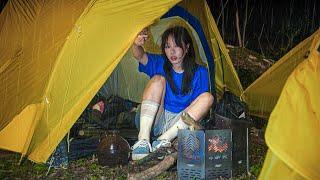The sound of rain above the tent and drinking alcohol alone  / solo camping