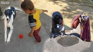 Love, empathy, cooperation of Zahra and Massoud in laying cement on the floor of the hut