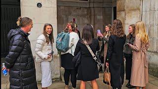 RUDE GROUP OF AUSSIE LADIES TELL JOKES TO TRY AND MAKE THE GUARD LAUGH at Horse Guards!