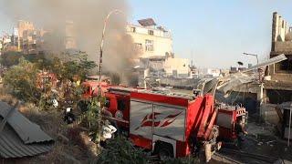 Emergency services at scene after 2 Israeli airstrikes hit Syria's capital and a suburb