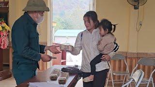 The mother and son brought the bag of money to the policeman to return to the owner.