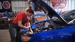 Female mechanic empowering women with garage