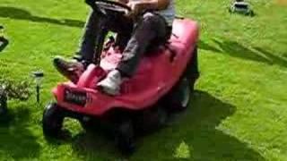 Champion Ride on LAwn Mower cutting grass