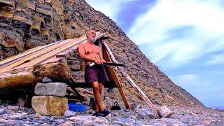 How to build a hut on the seashore and live alone.