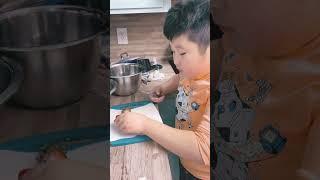 8 year old kid learns how to cut strawberry