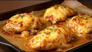 Perfect dinner: chicken fillet with mushrooms, onions and cheese in the oven 