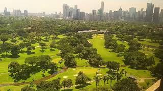 Breathtaking view of Manila GOLF COURSE and Makati Skyline