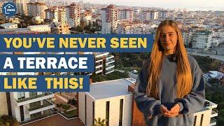APARTMENT FOR SALE WITH A HUGE TERRACE AND STUNNING VIEWS OVER THE CITY OF ALANYA, TURKEY
