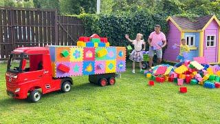 Sofia and Max playing Giant Toy truck and color Blocks