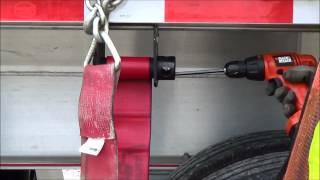 Trucking 101 - Roll up straps on a flatbed with a drill and allen key