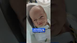Baby's bath time filled with smiles