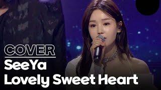 "Lovely Sweet Heart" sung by Seeya, who is on stage as a whole group