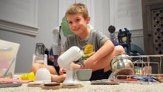 Happy Five Year Old Plays Independently with a Baking Play Set